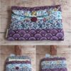 Pochette à livre de poche artisanale Modèle 5 à motifs d'éventails ginkgo prune et semis de petites fleurs bleues.