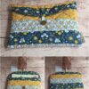 Pochette à livre de poche en tissu Modèle 3 matelassée aux motifs d'arcades rétro, fleurs bleues et rabat à bouton.