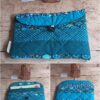 Pochette à livre de poche Modèle 10 en coton matelassé turquoise et bleu, ornée d'un patchwork de motifs d'éventails japonais et petits pois.